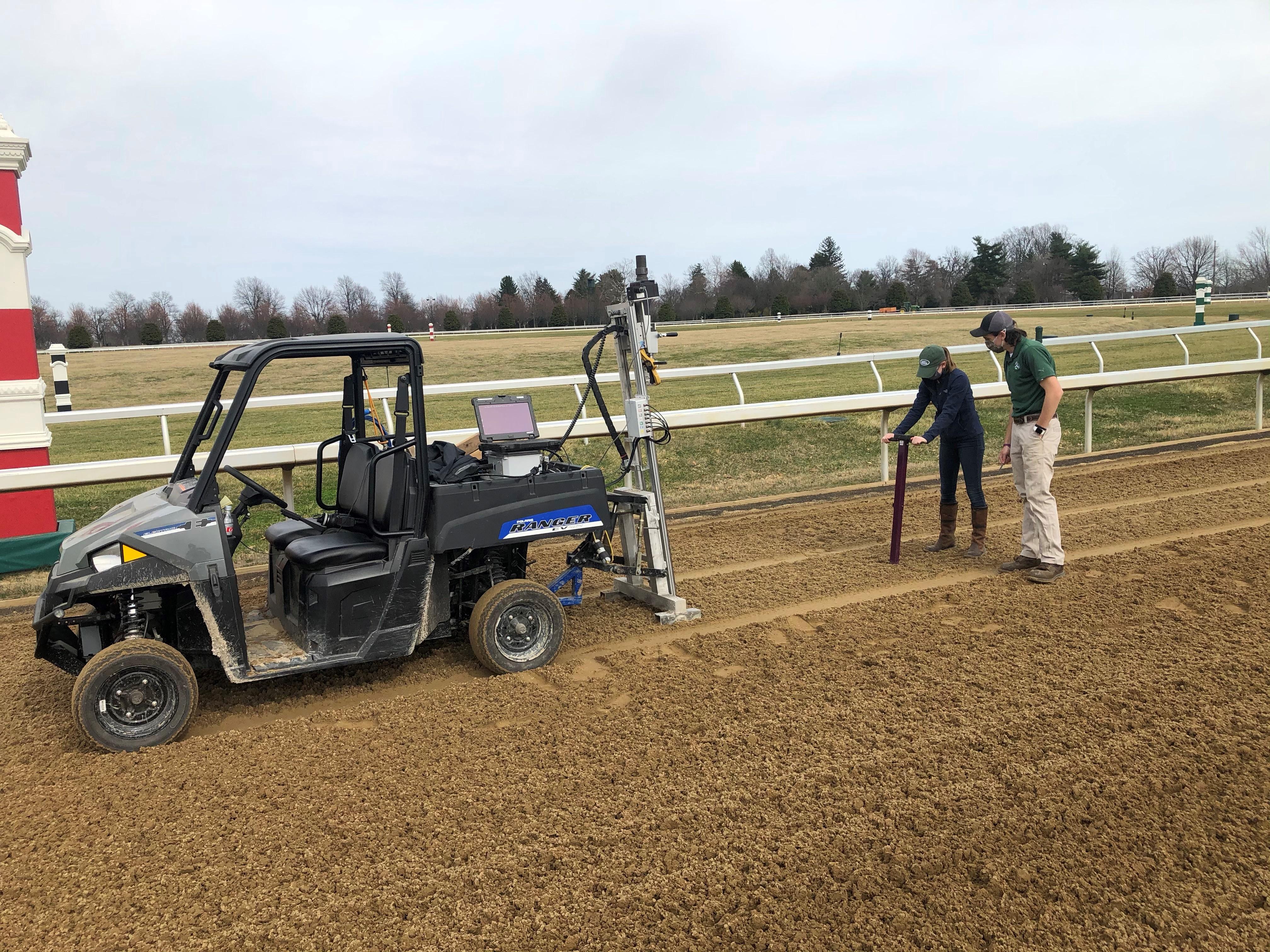 People testing a dirt track